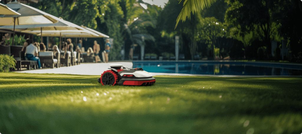 Kress RTKn robotic mower on a striped lawn beside a pool terrace